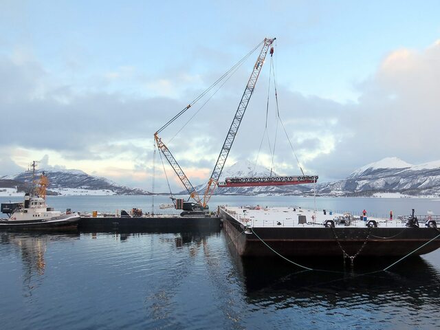 Ulstein Verft's heavy lift department at work using their Demag CC2800-1 mobile crane and 'Flex' barge.