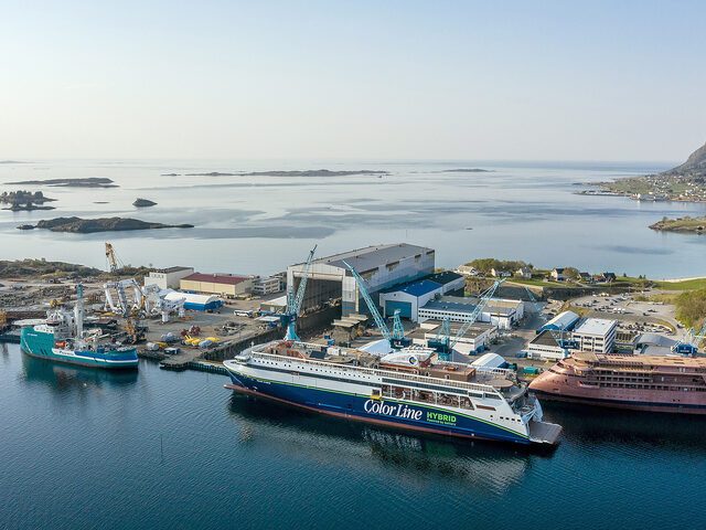 Three vessels at the Ulstein Verft yard, from right the expedition cruise vessel National Geographic Endurance, the RoPax vessel Color Hybrid and the walk-to-work vessel Acta Centaurus. Photo: Oclin.