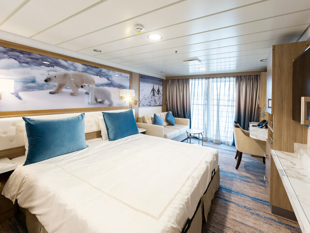 Triple stateroom on the 'Greg Mortimer'.